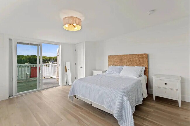 Main Bedroom with Private Deck on Second Floor - 13 Bay Ave