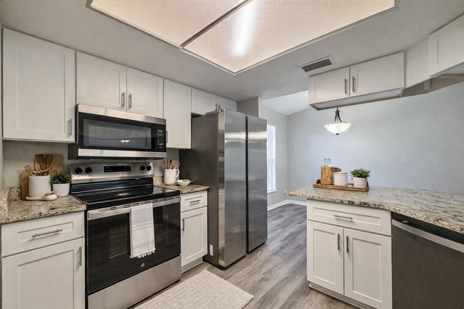 Photo - Move-In Ready 3 Bed Home with Garage & Fenced Yard in Tampa, FL