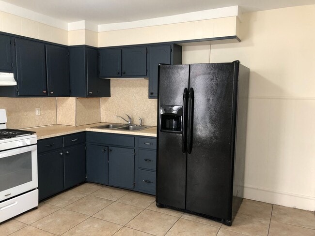 Photo - Great Home! Spacious and Updated! Wood Flooring! New Window! Eat-in-Kitchen! Yard!