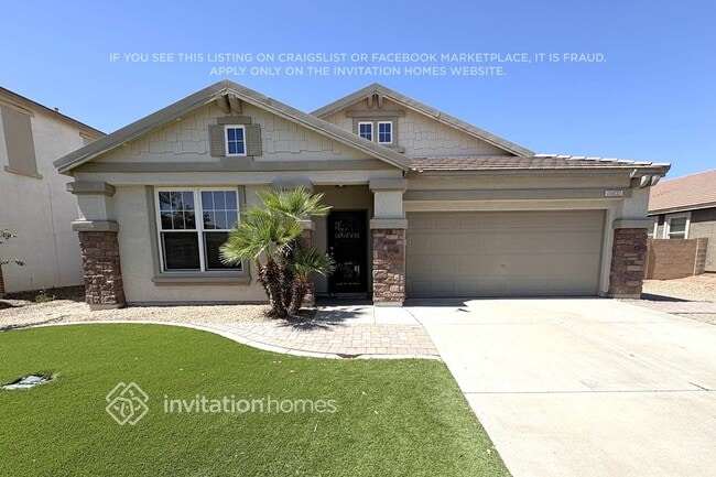 Building Photo - 15032 W Desert Mirage Dr