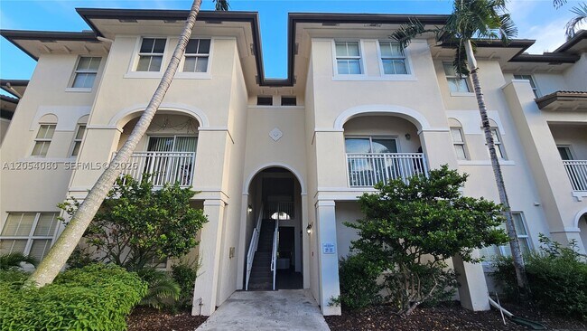 Building Photo - 11401 NW 89th St Unit 214