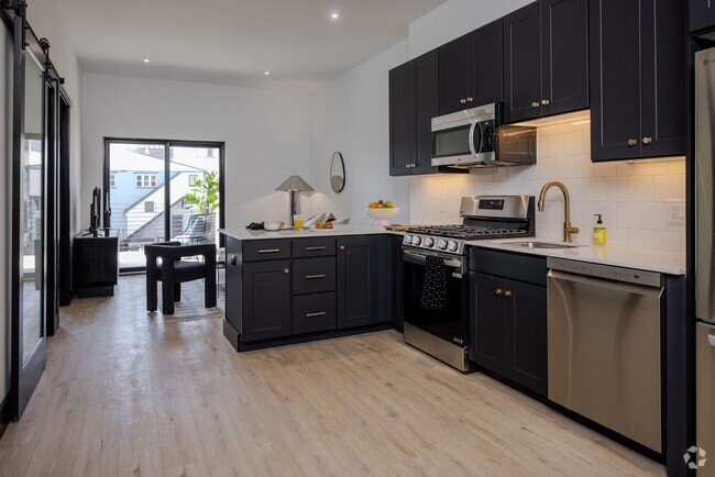 Building Photo - Watermark - Building 2 Now Open - Studio, ... Unit 1 Bedroom with Den Rental