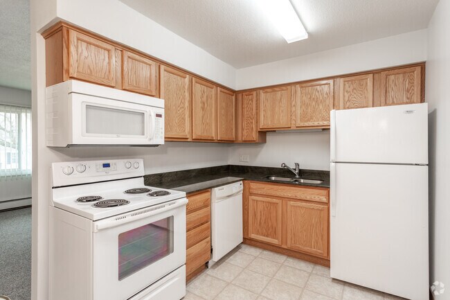 2BR - Kitchen - Elm Village Apartments