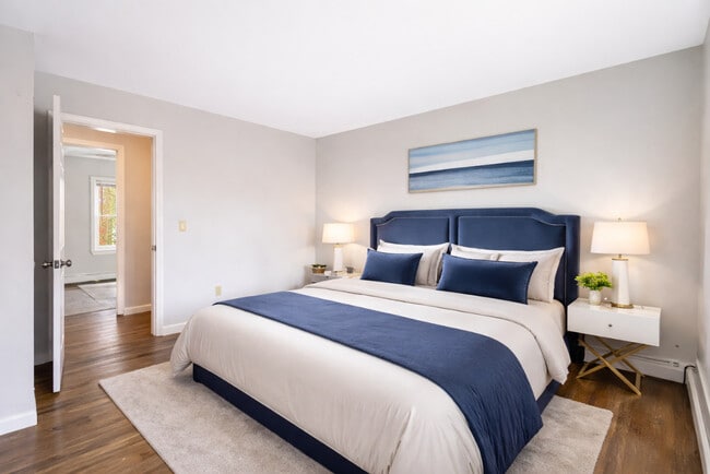 Bedroom featuring Hardwood Floor - Enby Gardens