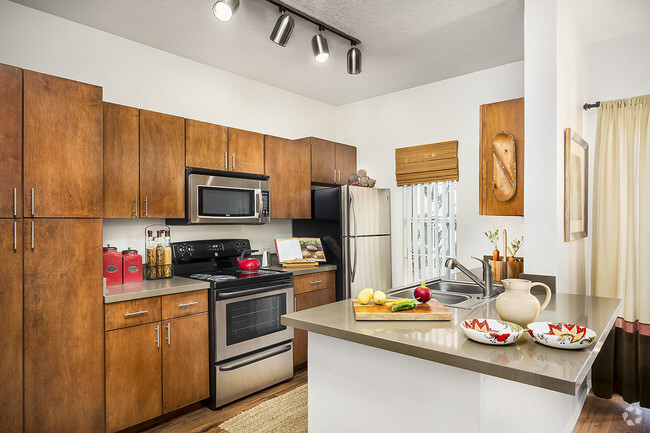 Full Kitchen with Microwave and Dishwasher - Pinnacle Highland Apartments