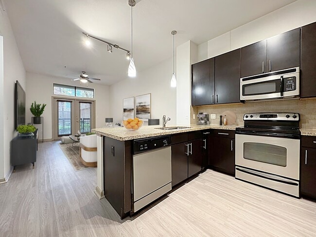 Building Photo - Midtown Elegance. Modern Lifestyle. Unit CPM2 Rental
