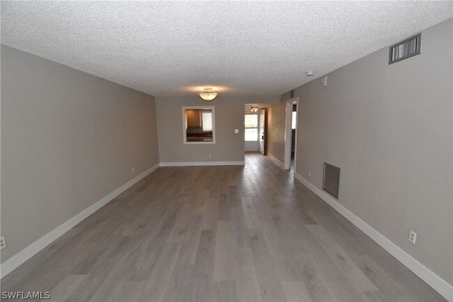 Building Photo - 5667 Rattlesnake Hammock Rd Unit B-205