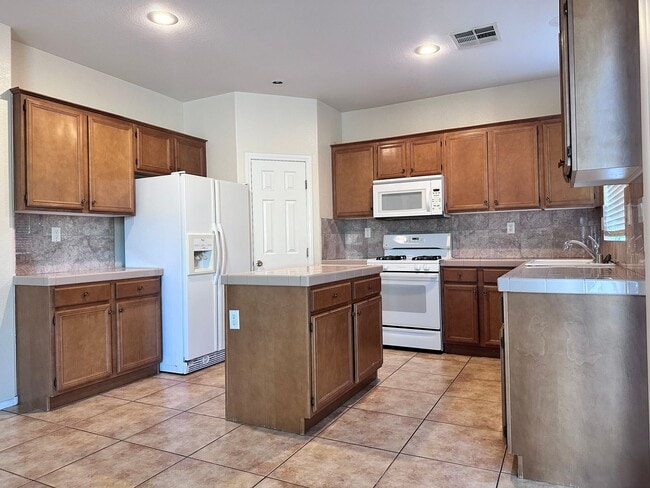 Photo - Welcome to this beautifully maintained two-story home offering 4 spacious bedrooms and 3 full bat...