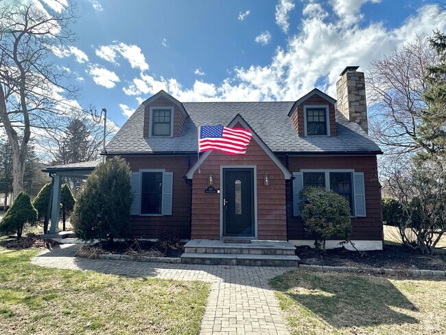 Building Photo - Charming Cape Cod Home with Updated Kitche...