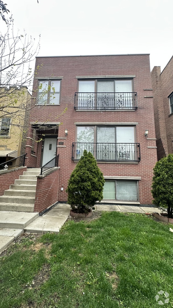 Building Photo - 5523 N Sawyer Ave Unit GARDEN Rental
