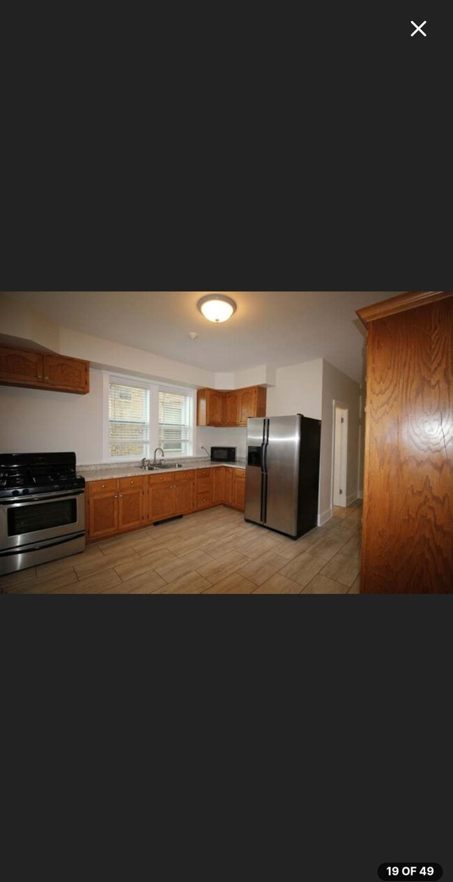 Building Photo - 6412 N Oakley Ave Unit 1st floor