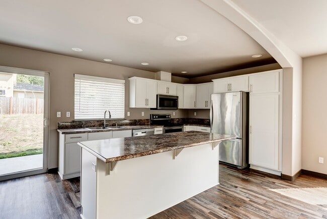 Photo - Stylish 3-Bedroom Home with Fenced Yard