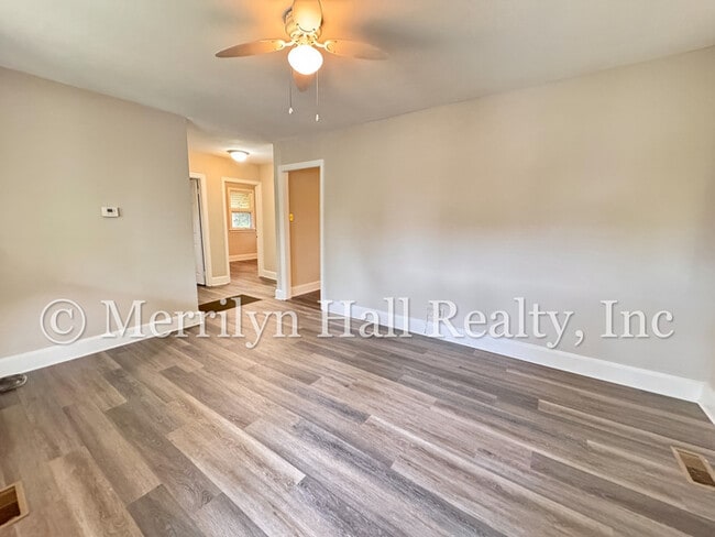 Photo - Freshly Updated 2BR Bungalow | New LVP Floors | Fenced Yard | Quiet Street