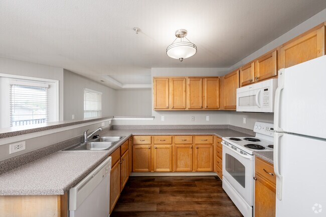3BR, 2BA - 1,452SF - Kitchen - Overlook at Valley Ridge Apartments