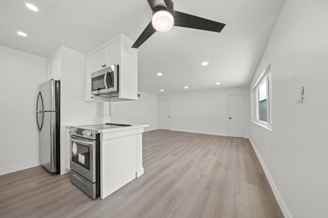 Building Photo - 3444 E Wilton St Unit 3