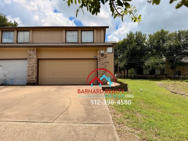Building Photo - Available July 18: 3 bedroom, 2.5 Bath Duplex with Garage and Fenced Yard