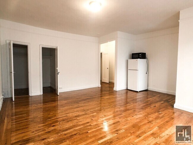 Building Photo - East 58TH ST Rental