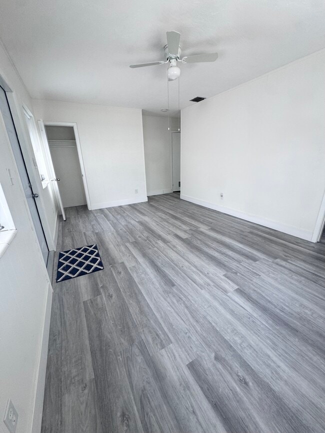 Living Room / Dining Room - 1030 Superior St Unit Back Apartment