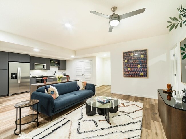 Open-concept floor plans seamlessly connect living and kitchen spaces, featuring contemporary finishes, stainless steel appliances, and ample room for relaxing or entertaining.