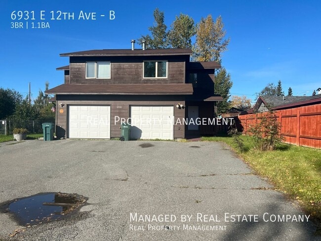 Building Photo - 6931 E 12th Ave Unit B
