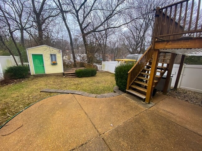 Photo - This classic 3 bedroom 2 bath Webster home features a front porch, large deck off the kitchen for...