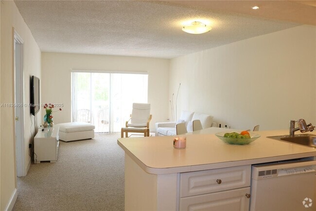 Building Photo - 7800 Camino Real Unit H-209 Rental