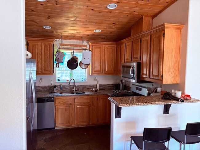 Photo - Mountain cabin with garage and fenced backyard