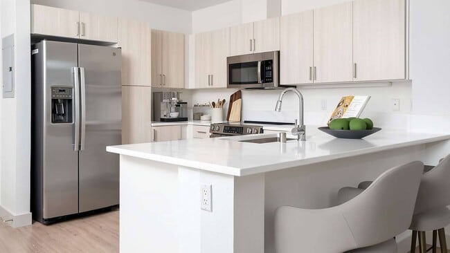 Luxury vinyl plank flooring in every room of the upgraded units in the North Building - Metro 112 Apartments