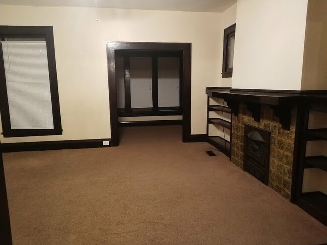 First Floor Spacious Living rm - decorative fireplace