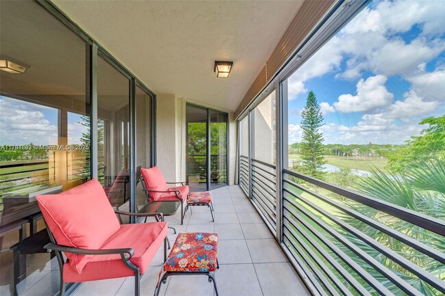 Building Photo - 7400 Radice Ct Unit 405 Rental