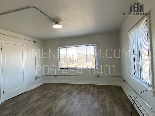 Photo - Historic Brick Studios in Walkable North Everett — Updated Kitchens, Natural Light & Select Views