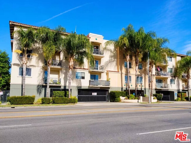 Building Photo - 13941 Sherman Way Unit 205