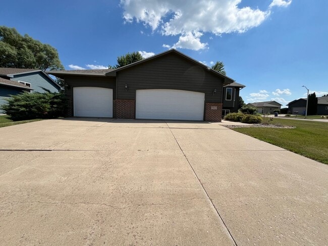 Photo - Stunning 4 Bed/2 Bath with 3 Car Garage and Fenced in Yard!