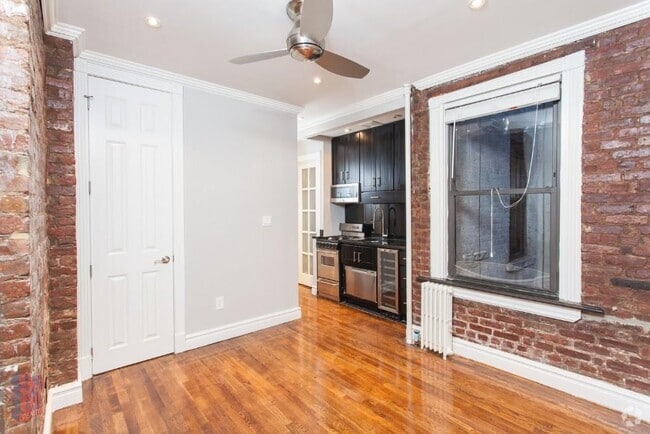 Building Photo - 410 E 13th St Unit 5C Rental