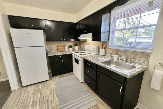 Virtually staged with ChatGPT to reflect the true potential of this floor plan. - Village Park Apartments