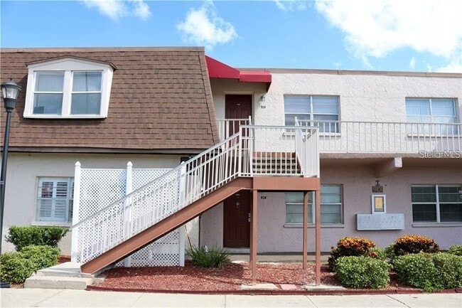 Building Photo - 9101 W Hillsborough Ave Unit I207