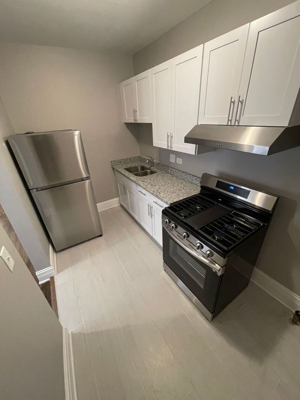 Building Photo - 11023 S Vernon Ave