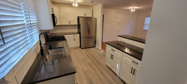 Photo - Tiehen Realty - Booth Unit 3906 Booth