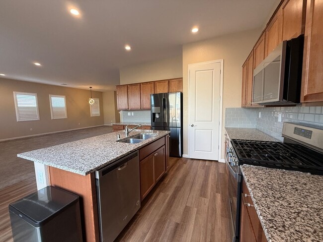 Photo - Experience refined living in this beautifully appointed 4-bedroom + den, 3-bath executive residence.