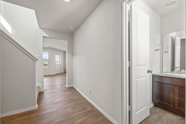 Photo - 2 Week Free Move-In Special!Spacious 4 Bed / 2.5 Bath Home – 2,243 Sq Ft + Resort-Style Amenities