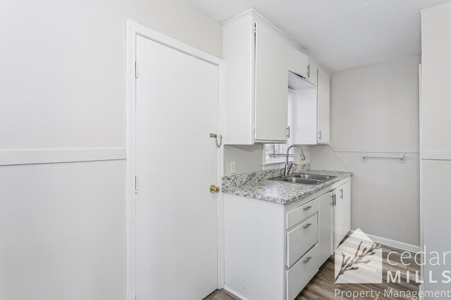 Photo - Updated, clean unit, with LARGE basement for storage!