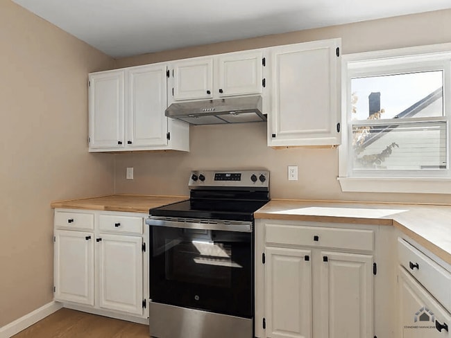 Photo - Spacious 4-Bedroom Home with Garage & Modern Heating for Rent in Waterville