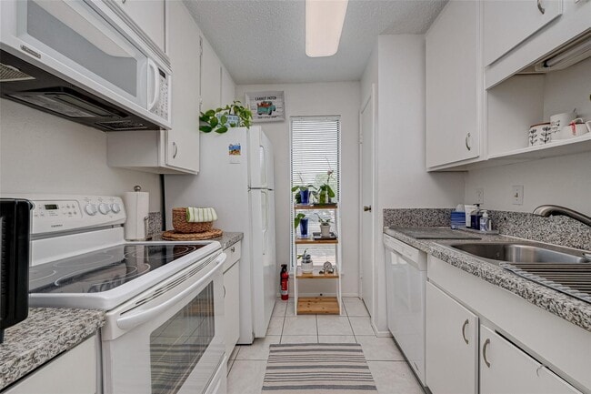 Building Photo - 7900 N Stadium Dr Unit 260