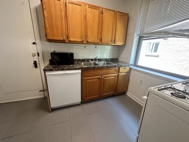 2228-38 Sherman Ave. / 803-809 Noyes St.