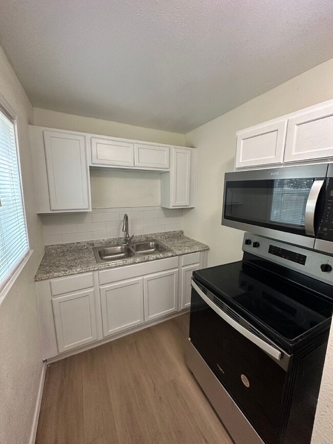 Photo - Fully update back house! All appliances included!