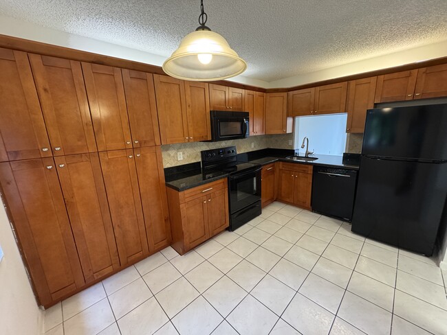 Building Photo - 3733 Carambola Cir N Rental