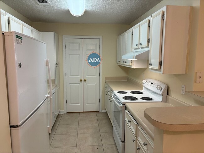 Photo - Spacious 3-Bedroom Villa in Woodbridge – Tile Flooring, Laundry Room, and Prime Bluffton Location!