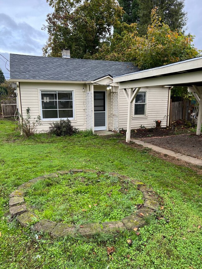 Building Photo - Small 2 bedroom home with carport