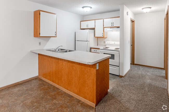 2BR, 1BA - 696SF - Kitchen - Paris Place Apartments