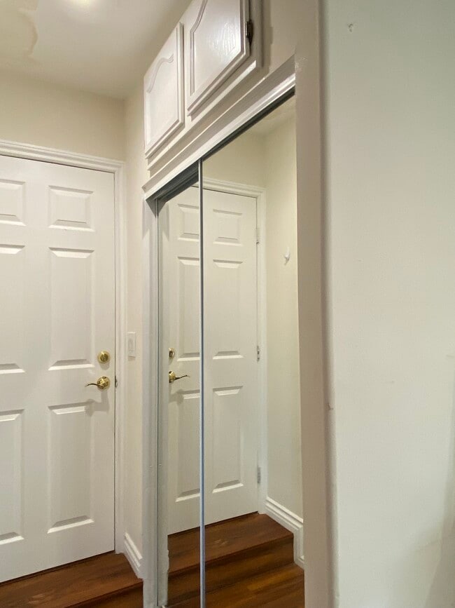 Mirrored closet with above storage - 611 S Griffith Park Dr Unidad Equestrian Rancho studio